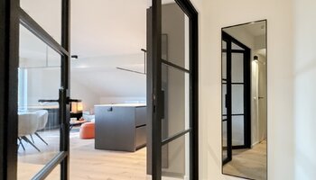 Prachtig gerenoveerde penthouse in het Zoute met open zicht